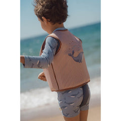 Child wearing the Little Dutch swim vest Ocean World