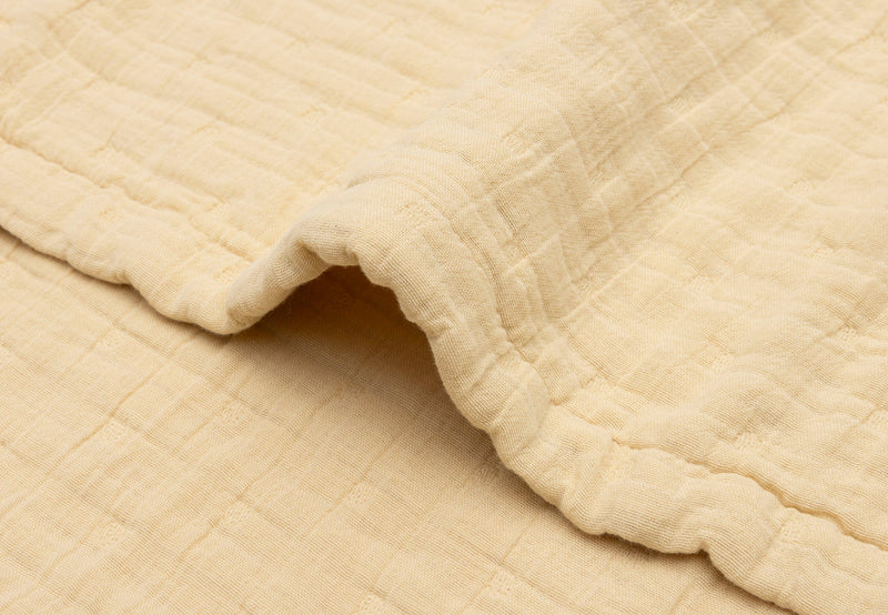 Close up of the Jollein Vanilla jacquard muslin