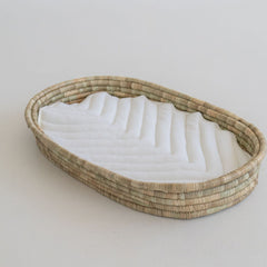Ko-Coon changing basket with milky white quilted padding