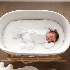 Baby sleeping on the Ko-Coon merino mattress