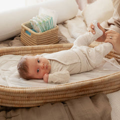 Baby on the Ko-Coon changing basket